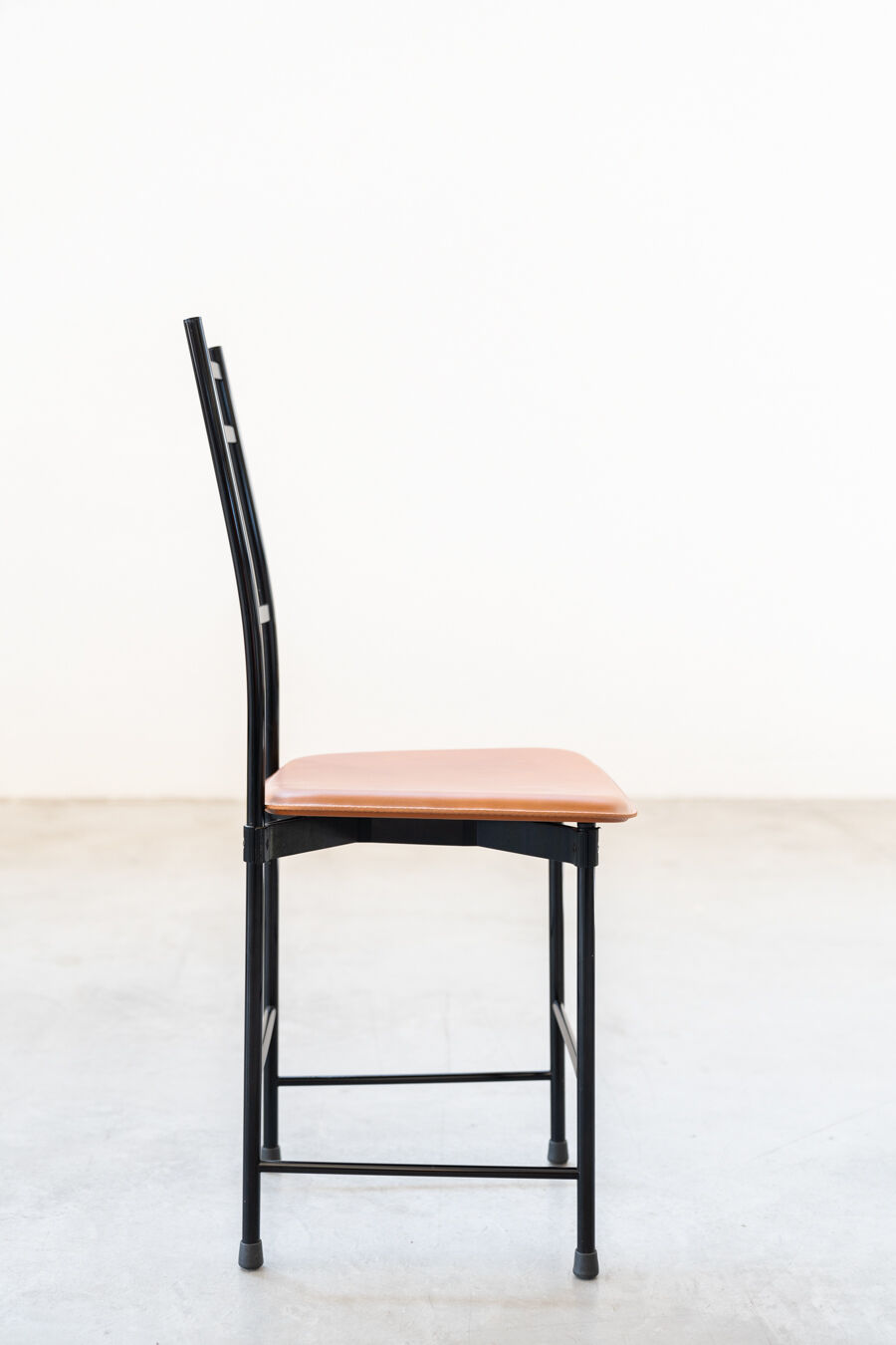 Dining chairs in brown leather and aluminum by ycami, 1980