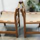 Pair of elm and leather chairs by Maison Regain