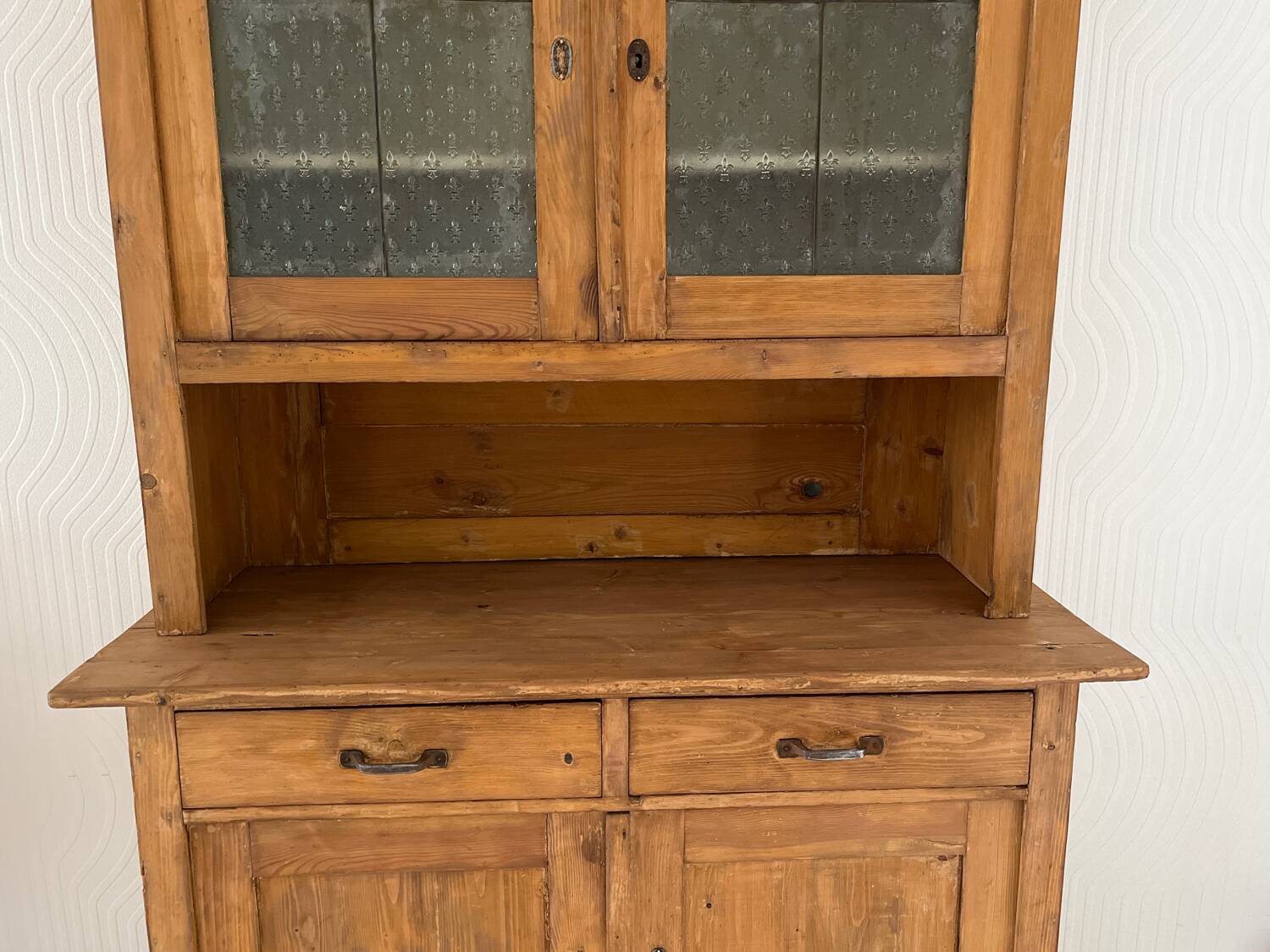 Antique dresser with glass doors and fleur-de-lys from the 50s