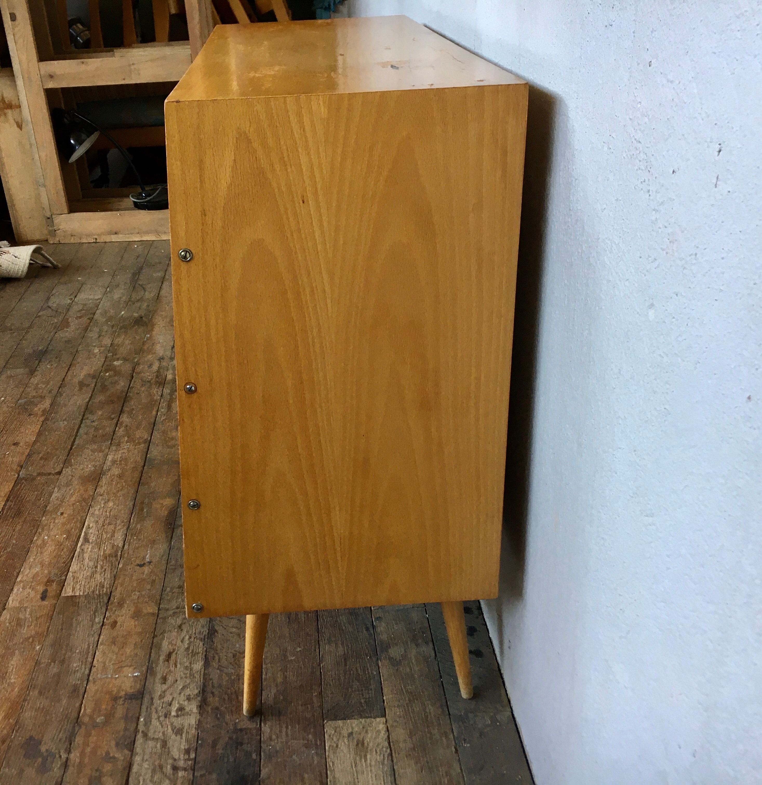 50s color formica shoe cabinet with compass feet