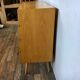 50s color formica shoe cabinet with compass feet