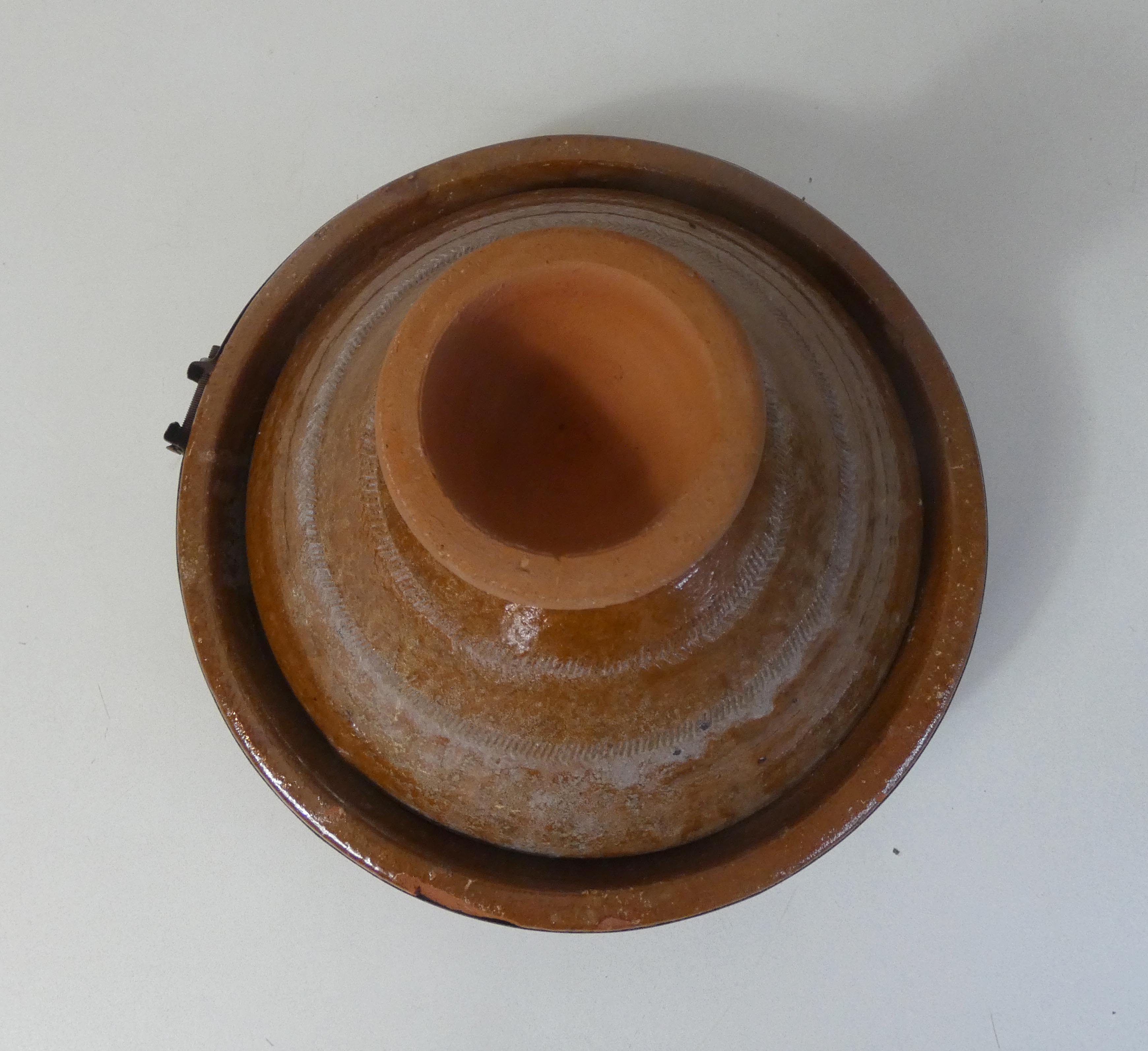 Old glazed terracotta tagine