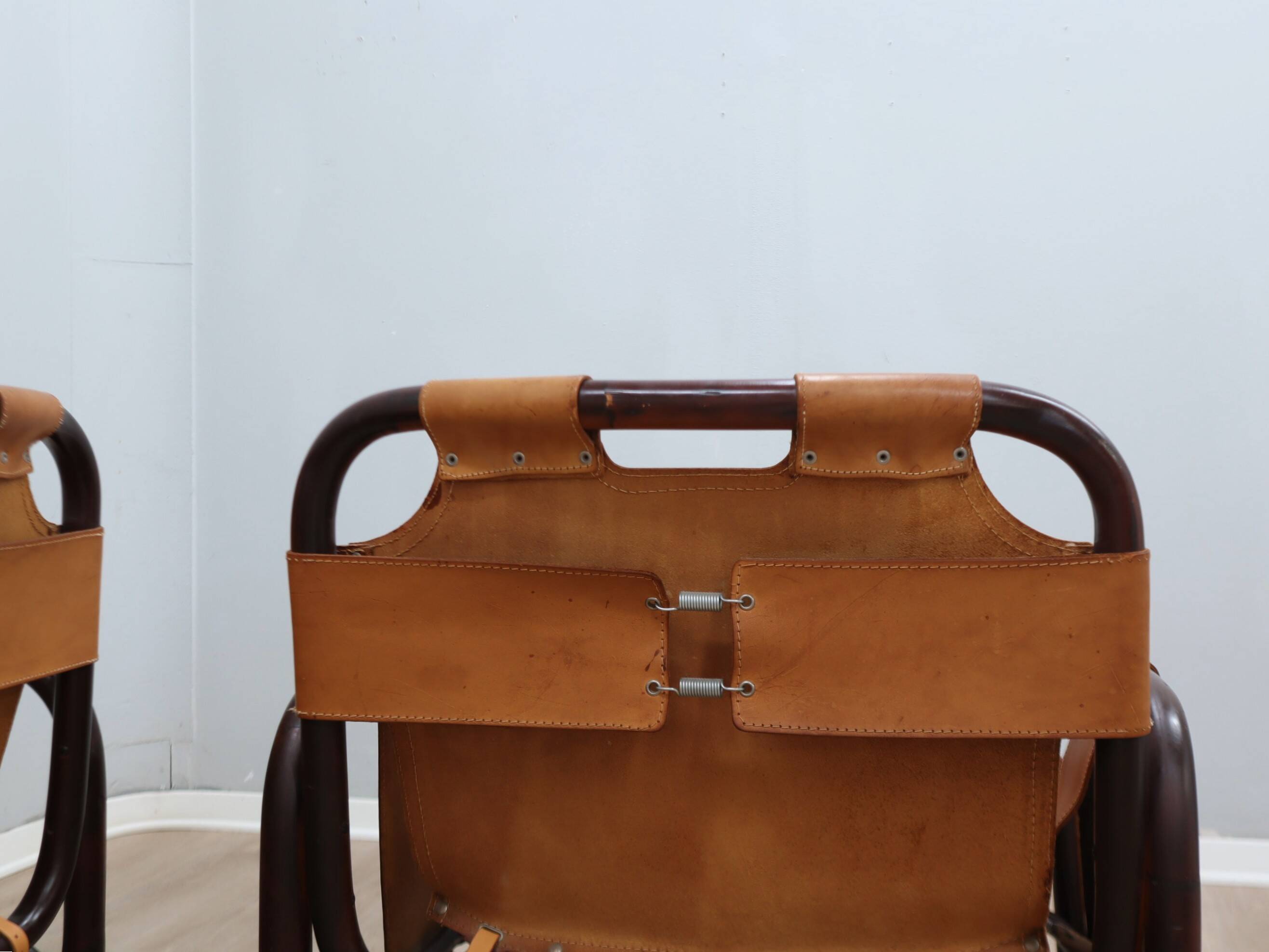 A vintage Tito Agnoli armchair leather and bamboo 1960s