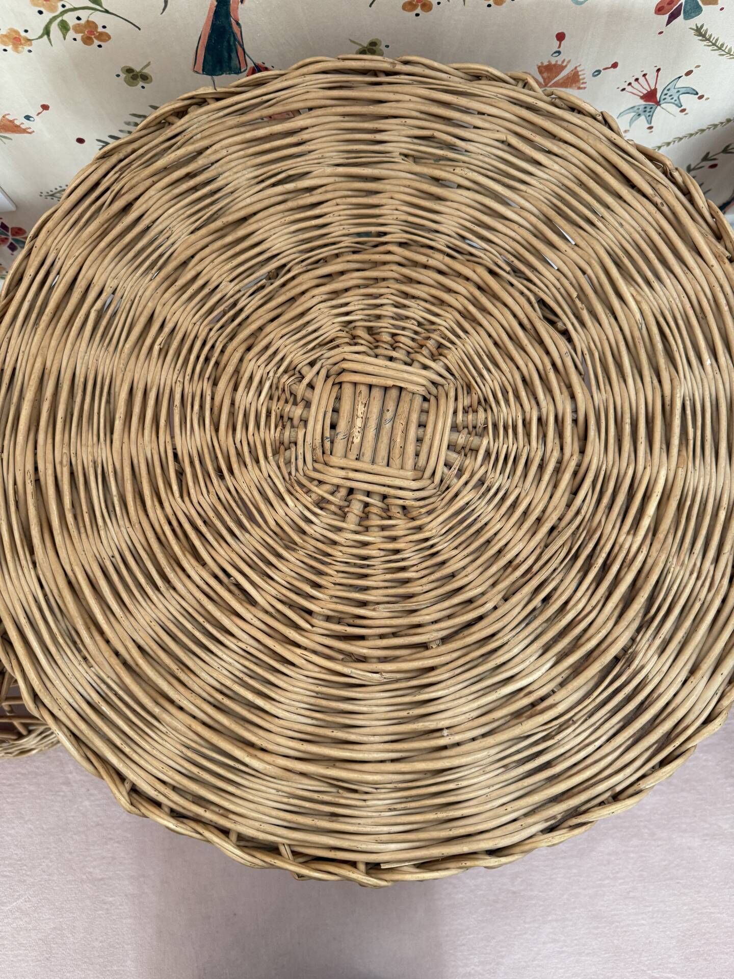 Table and two wicker chairs for children.