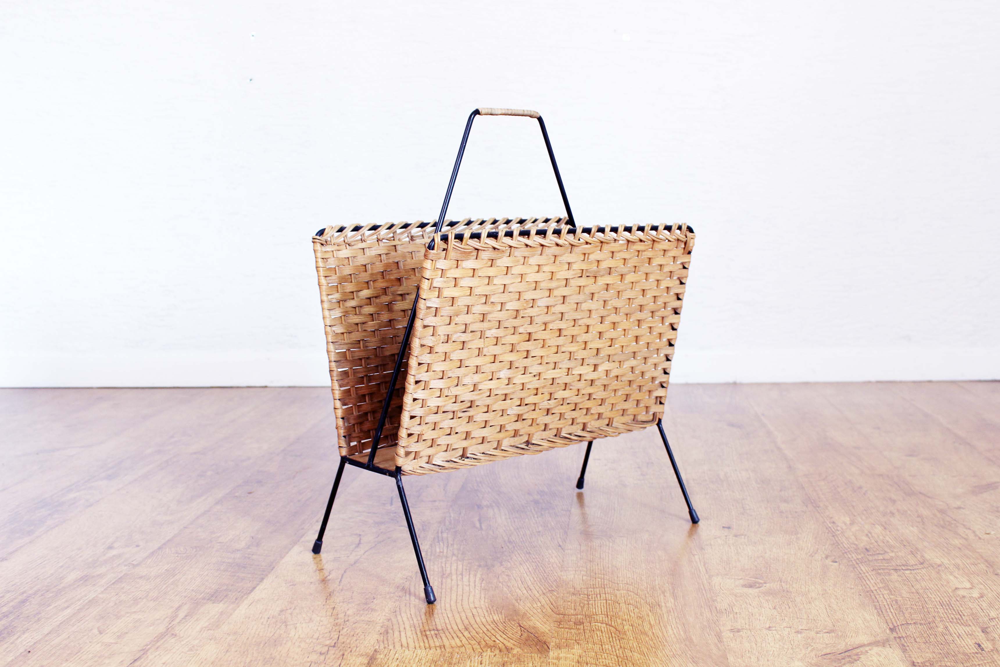 Vintage wicker magazine rack