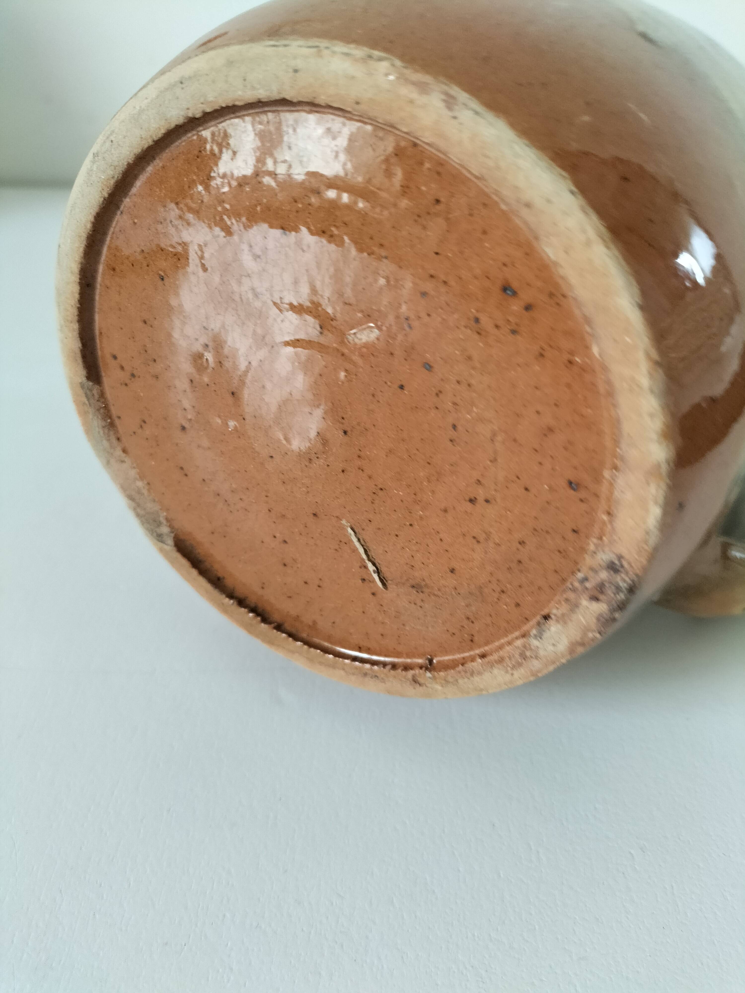 Glazed earthenware jug