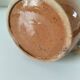 Glazed earthenware jug