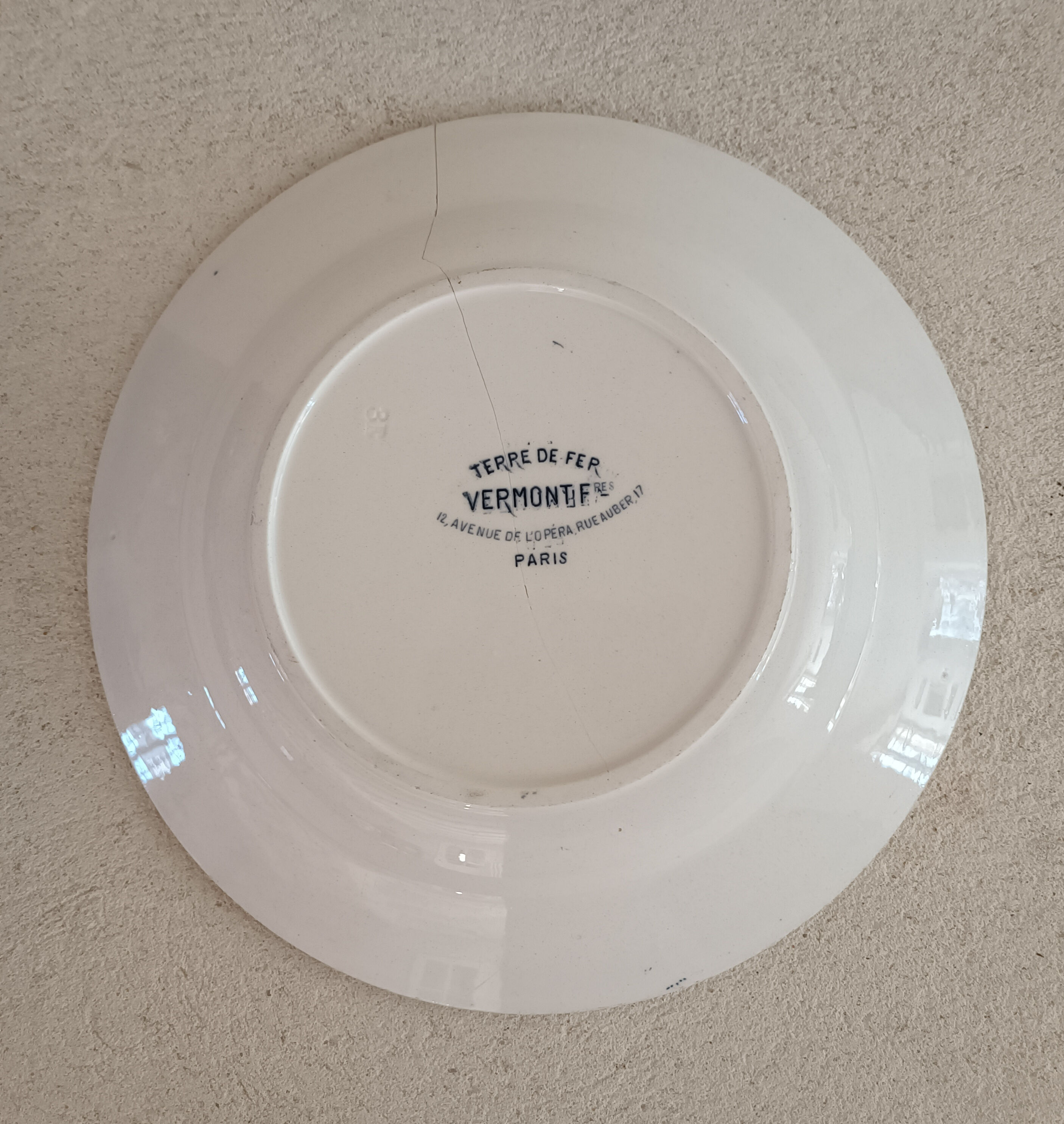 Plate iron earth monogram B