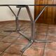 Oval table. 1970. Steel and smoked glass. 180x100