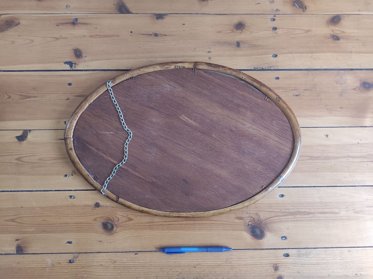 Vintage oval rattan mirror