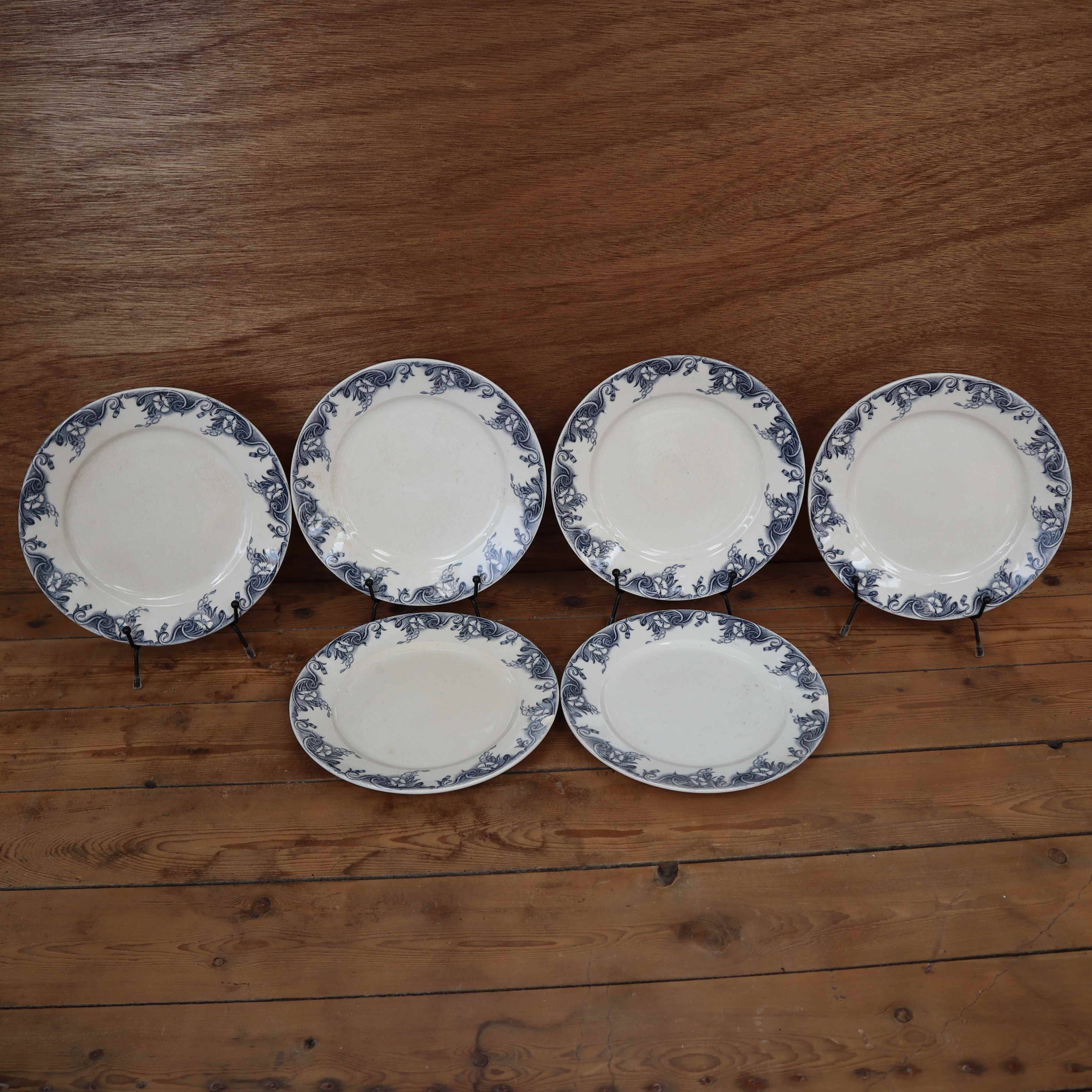 Antique earthenware dessert plates with the lions of France "Pernelle"