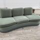 Rounded sofa with fringes