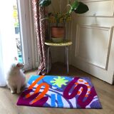 Tufted graphic rug