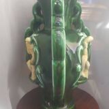 Earthenware vase with 3 caryatids
