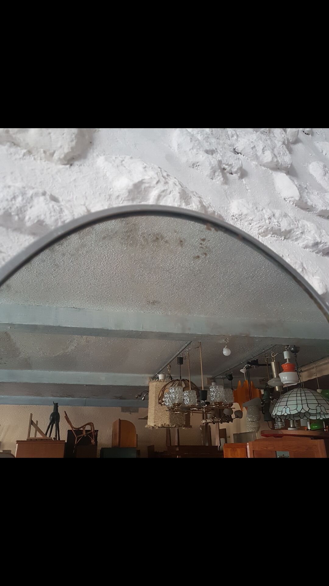 Old aluminum oval mirror