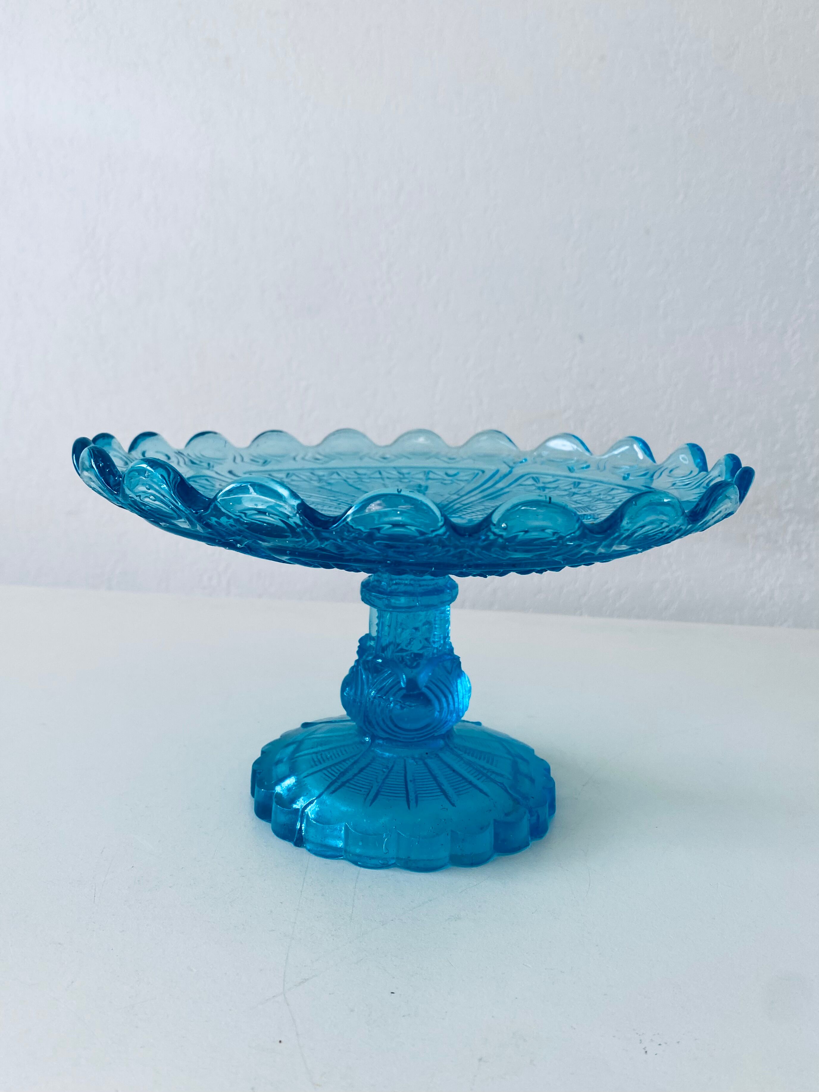 Blue glass stand cup