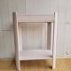 Small renovated Art Deco console in nude colour.