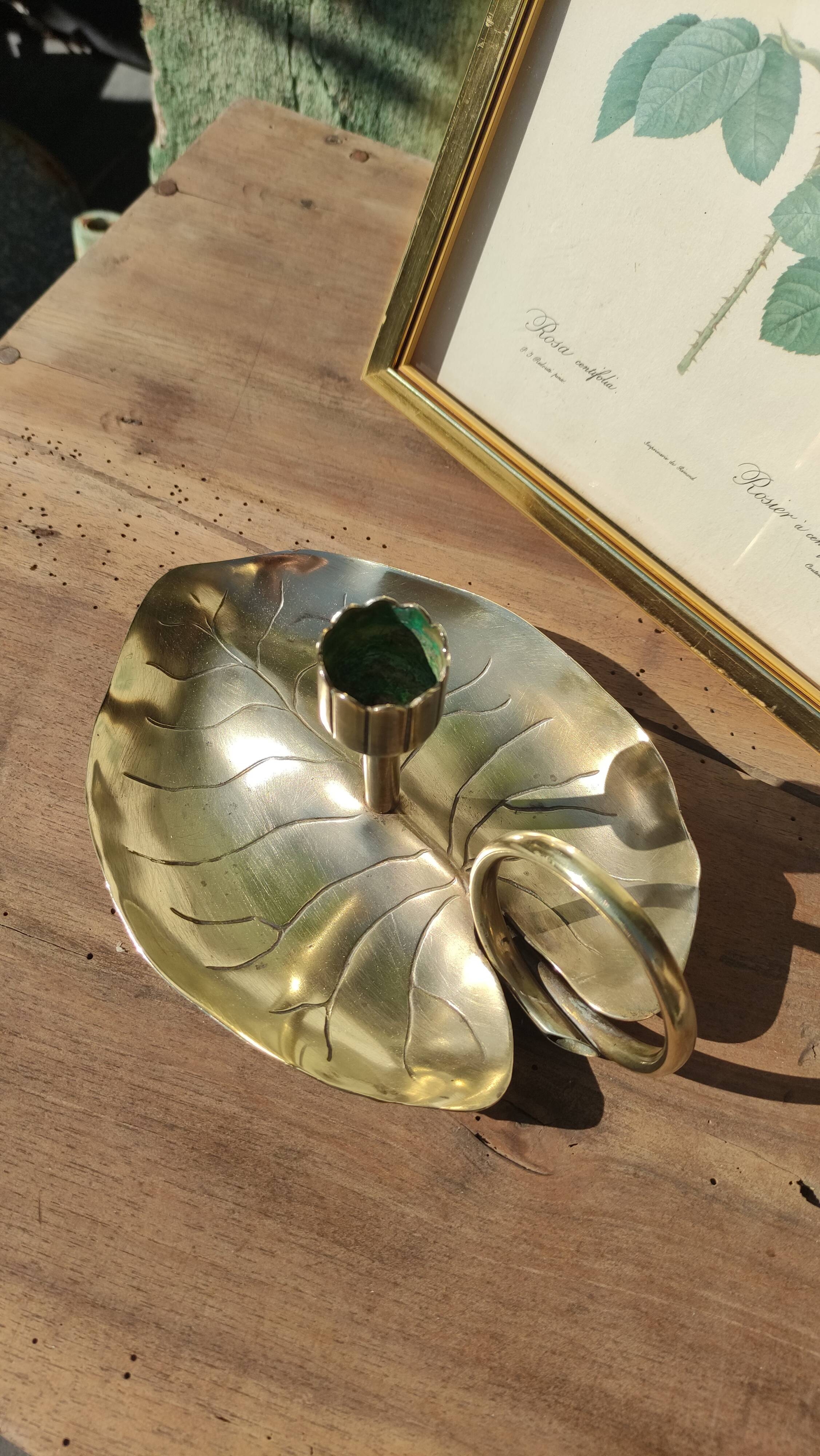 Vintage candle holder in golden brass