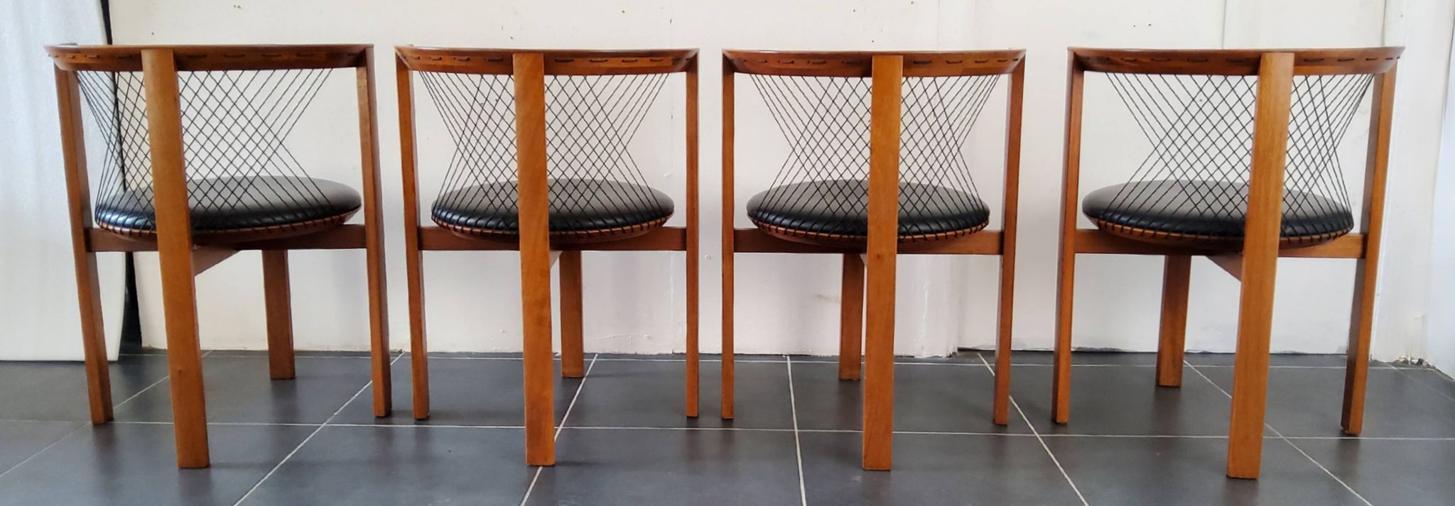 Niels Jorgen Haugesen String wood and leather chairs for Tranekaer, Denmark