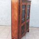 Louis XVI glass-fronted library in rosewood and amaranth veneer.
