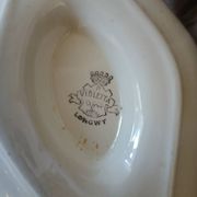 Antique sauce boat in Longwy ironstone.