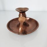 Set of a pair of candle holders and a hand candle holder