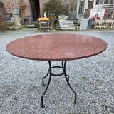 Round marble table with wrought iron base from the mid-20th century.