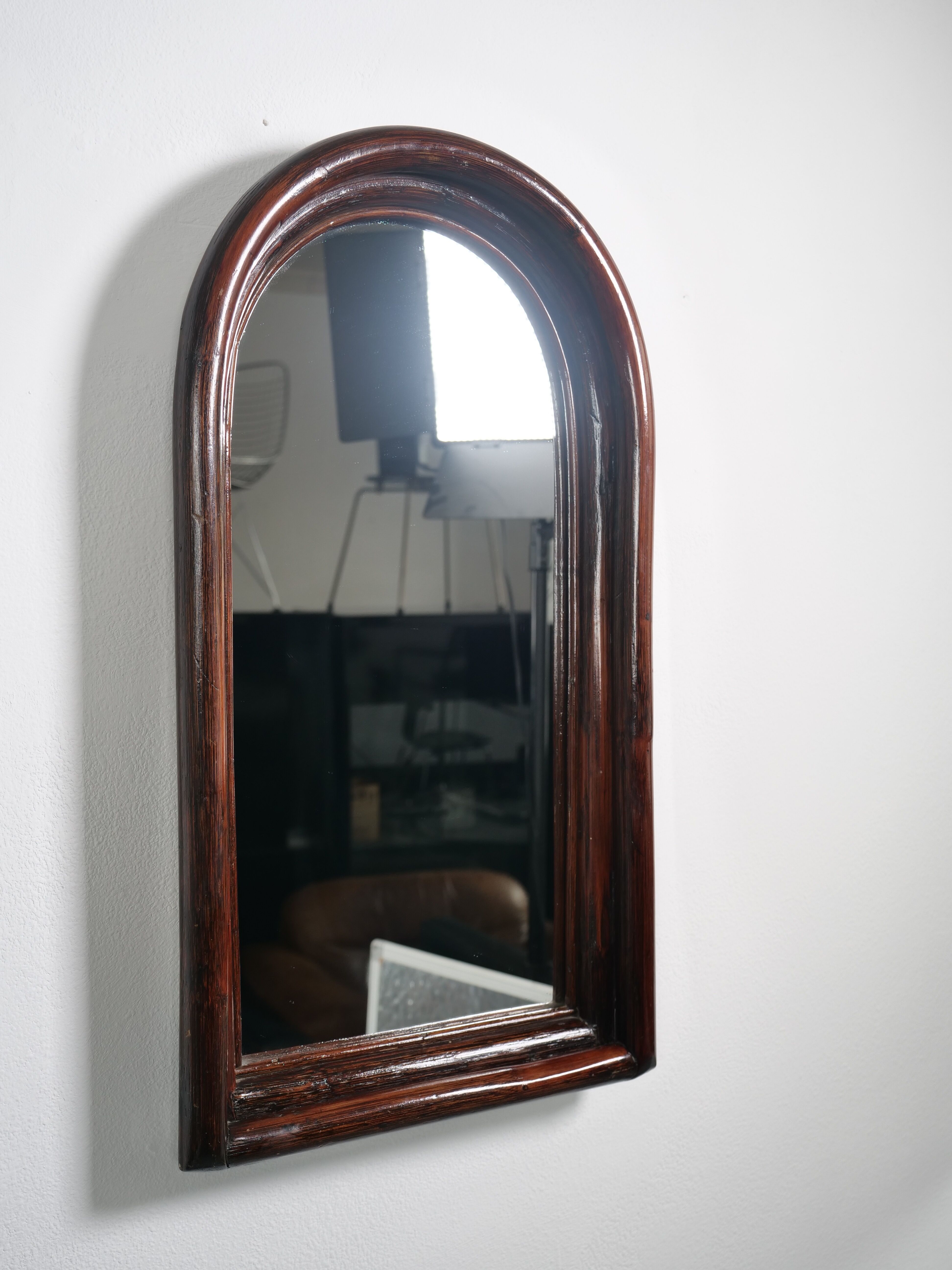 Dark rattan mirror