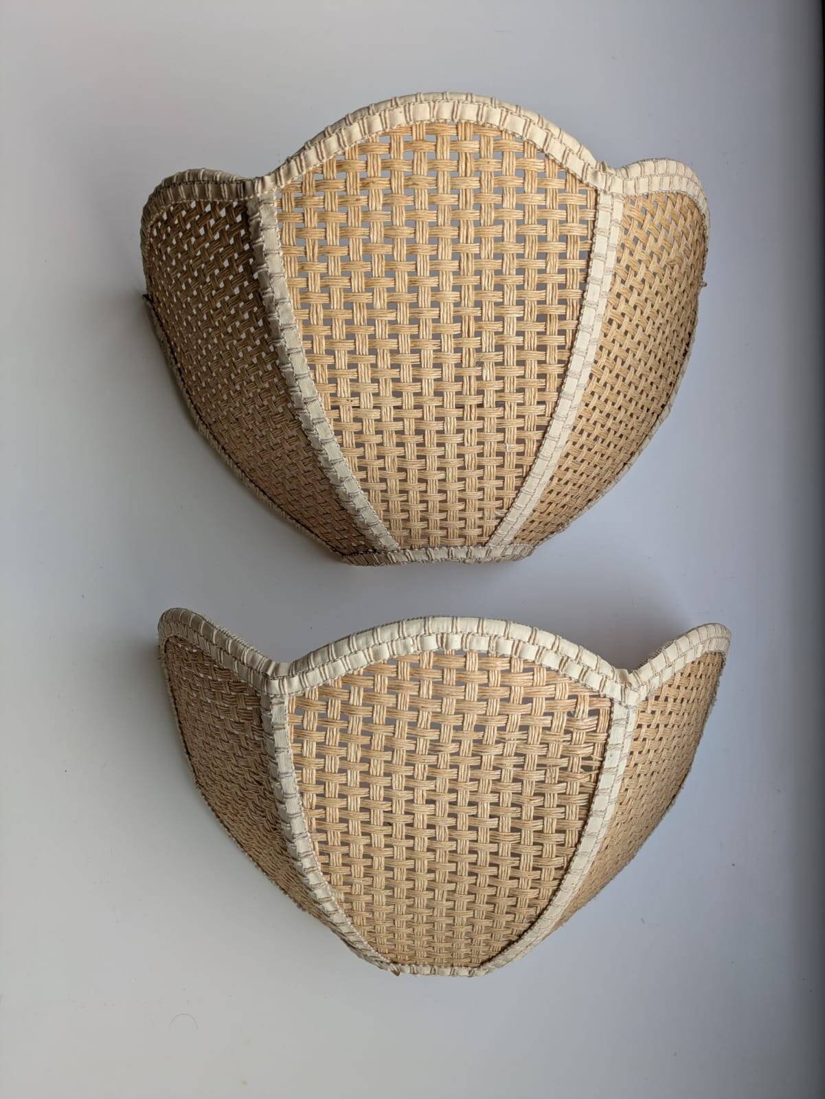 Pair of shell sconces in braided raffia