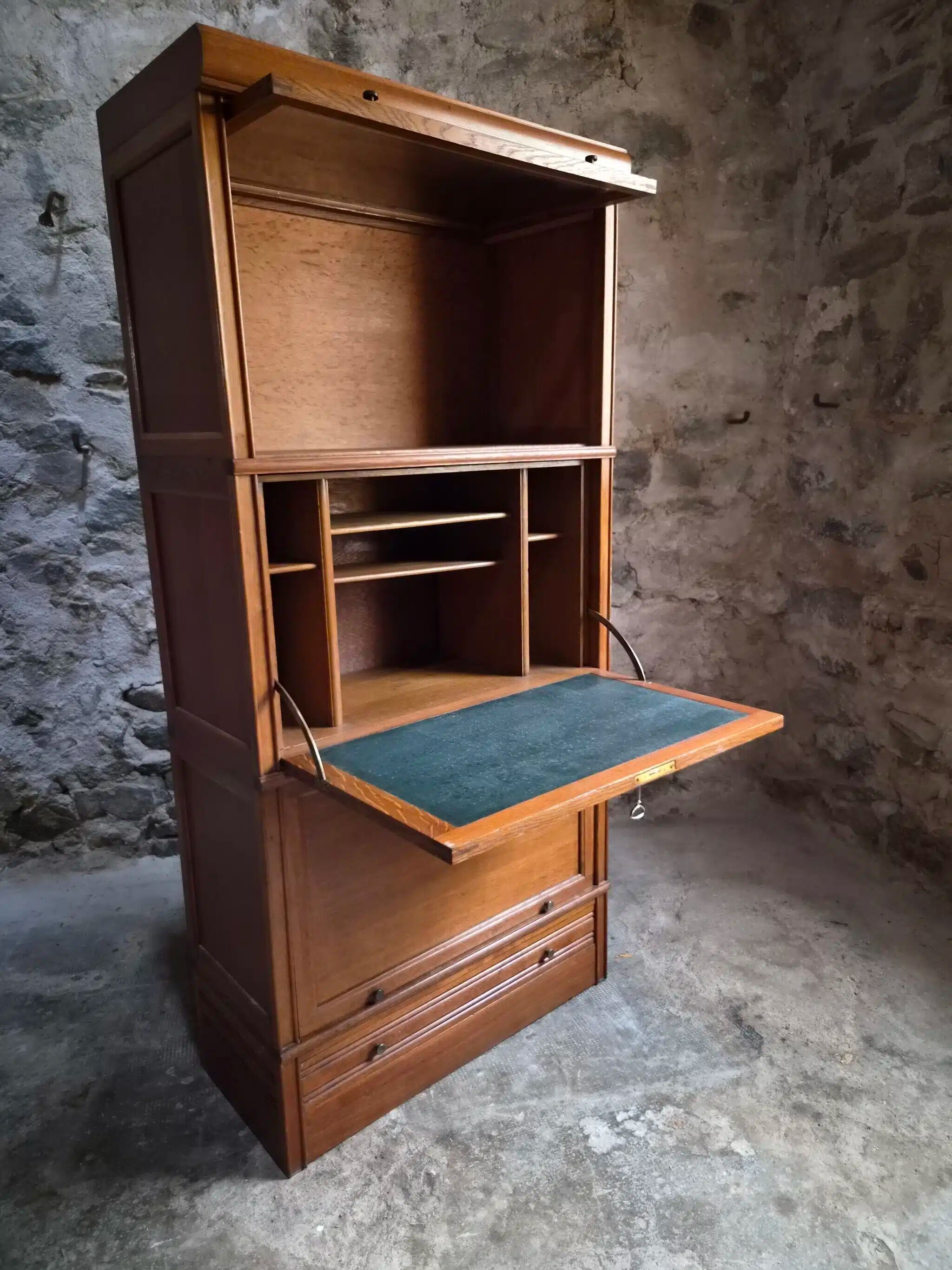 French modular secretary in oak with display case, 1950s.