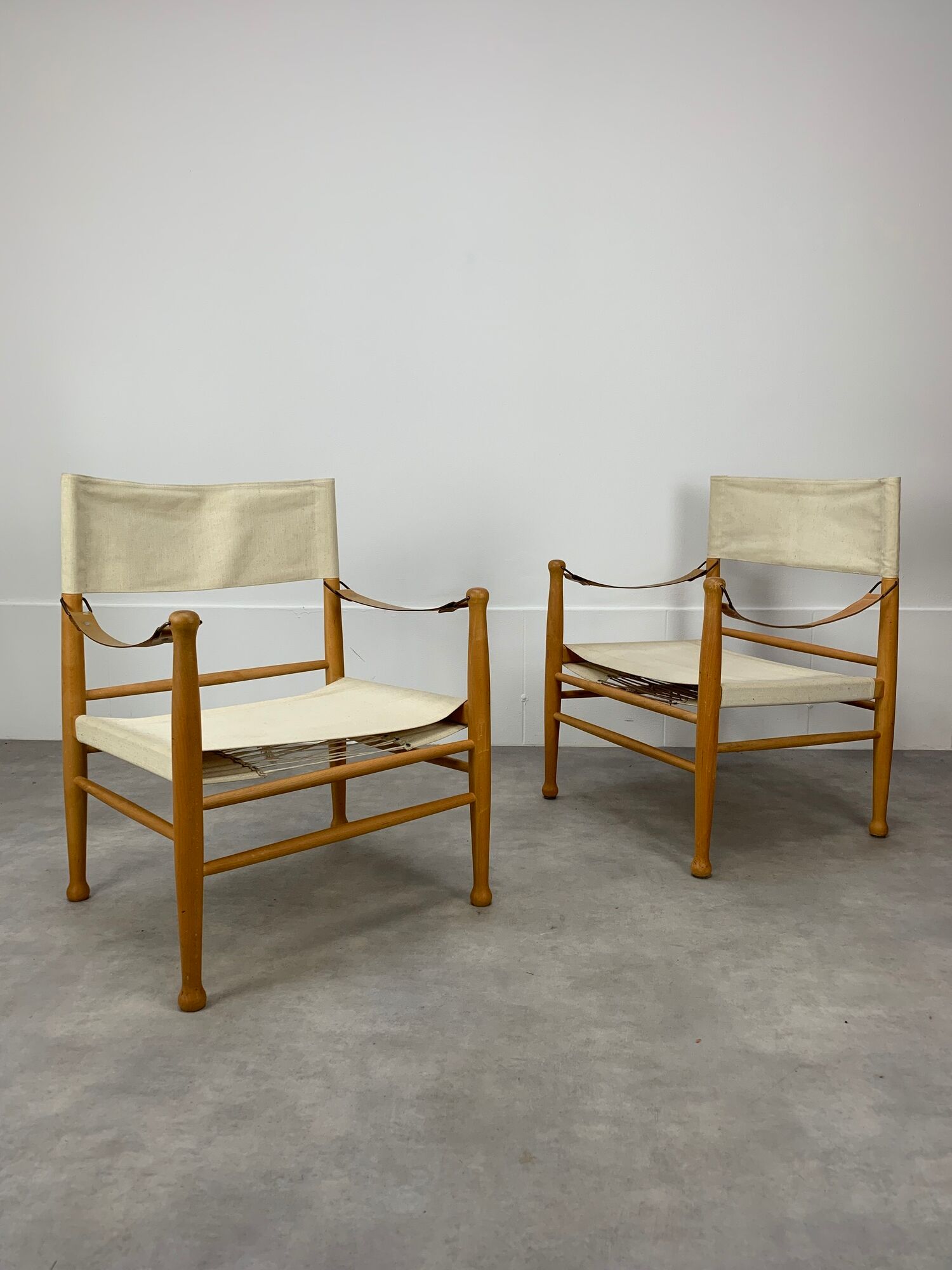 Pair of safari armchairs canvas and leather stretched
