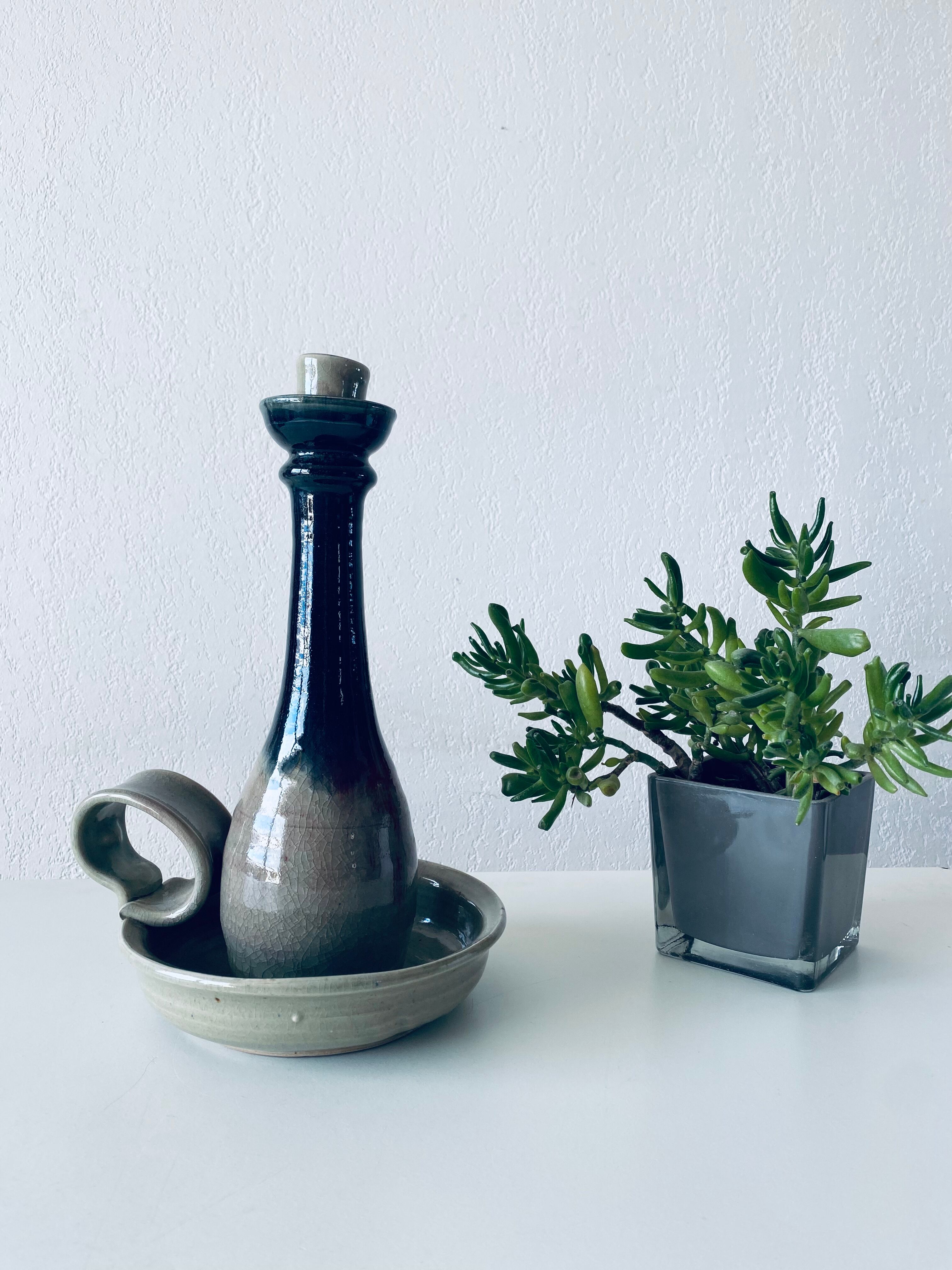 Candle holder in glazed ceramic