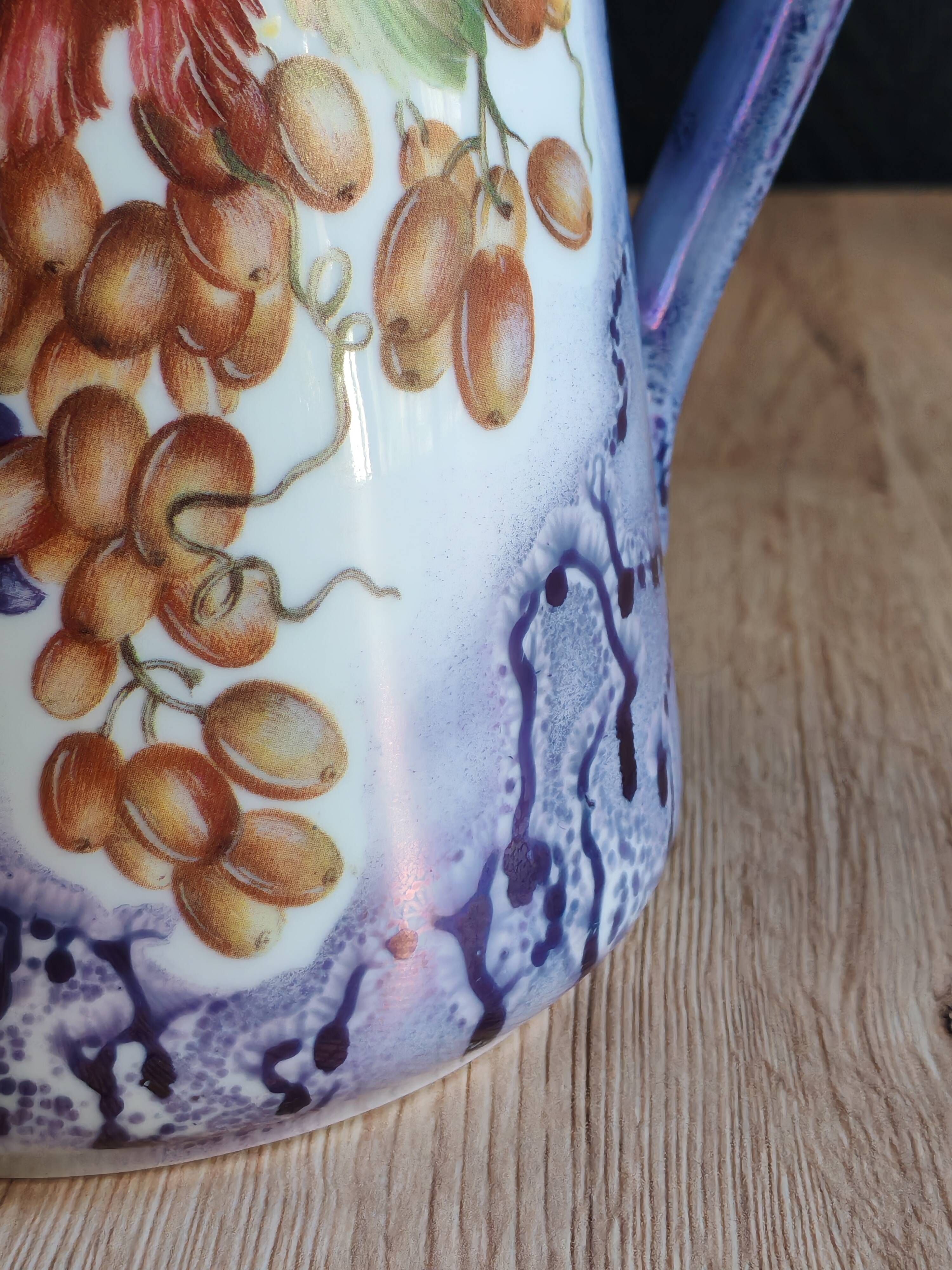 Vintage porcelain pitcher Lusseray France, decorated with grape clusters.
