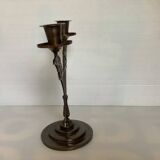 Candle holders in the shape of art deco butterfly wings