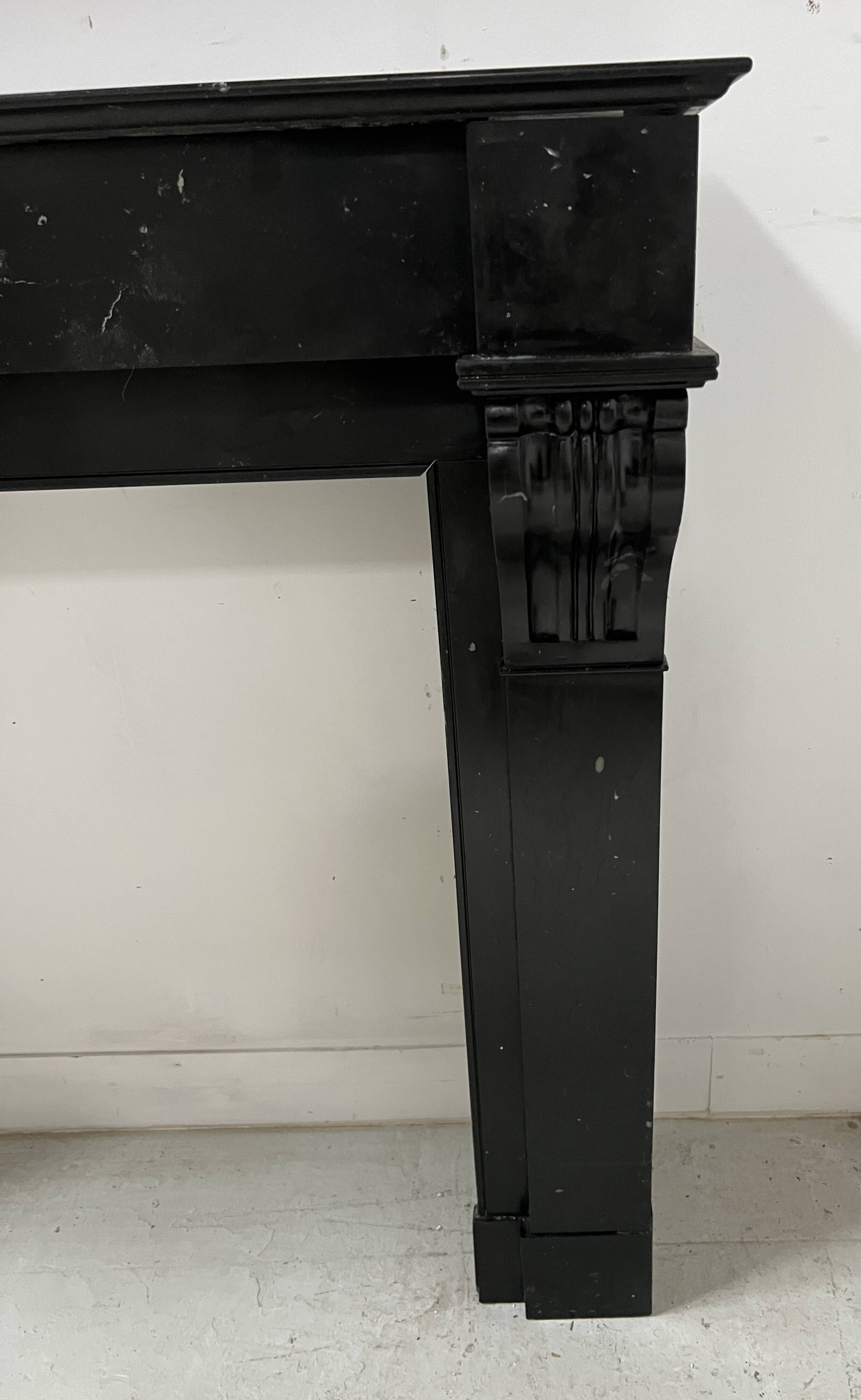 Napoleon III fireplace with a black marble corbel, 19th century.