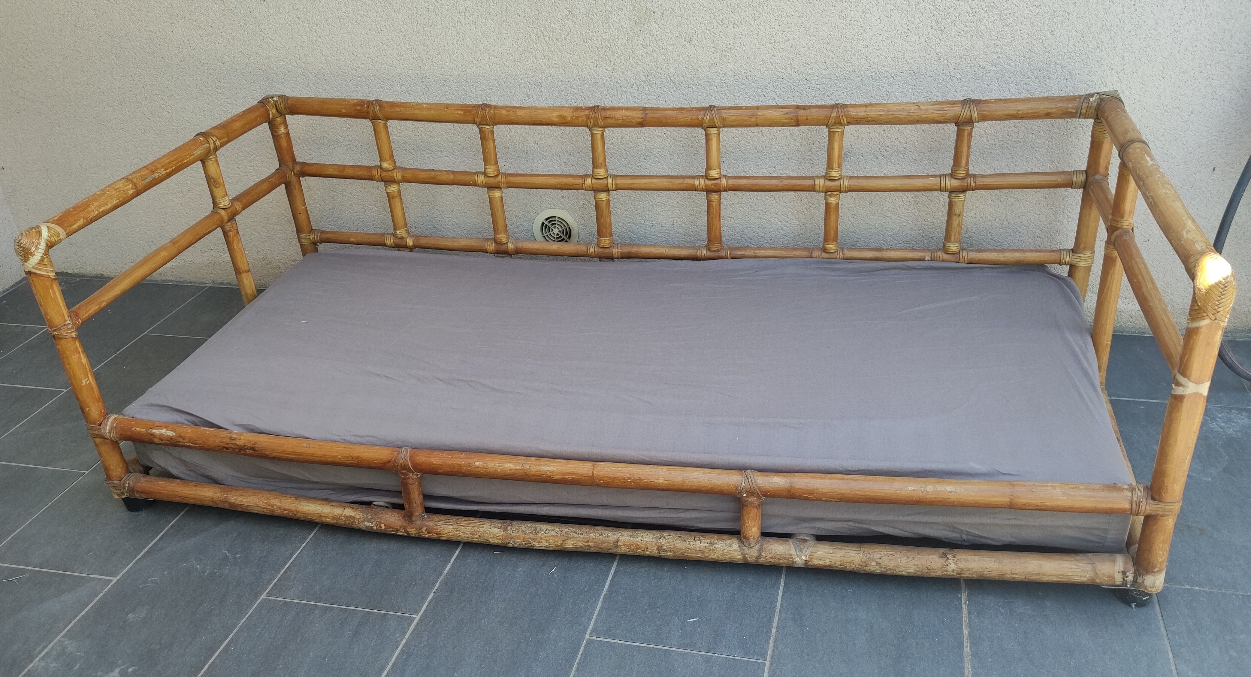 Large vintage rattan sofa bed