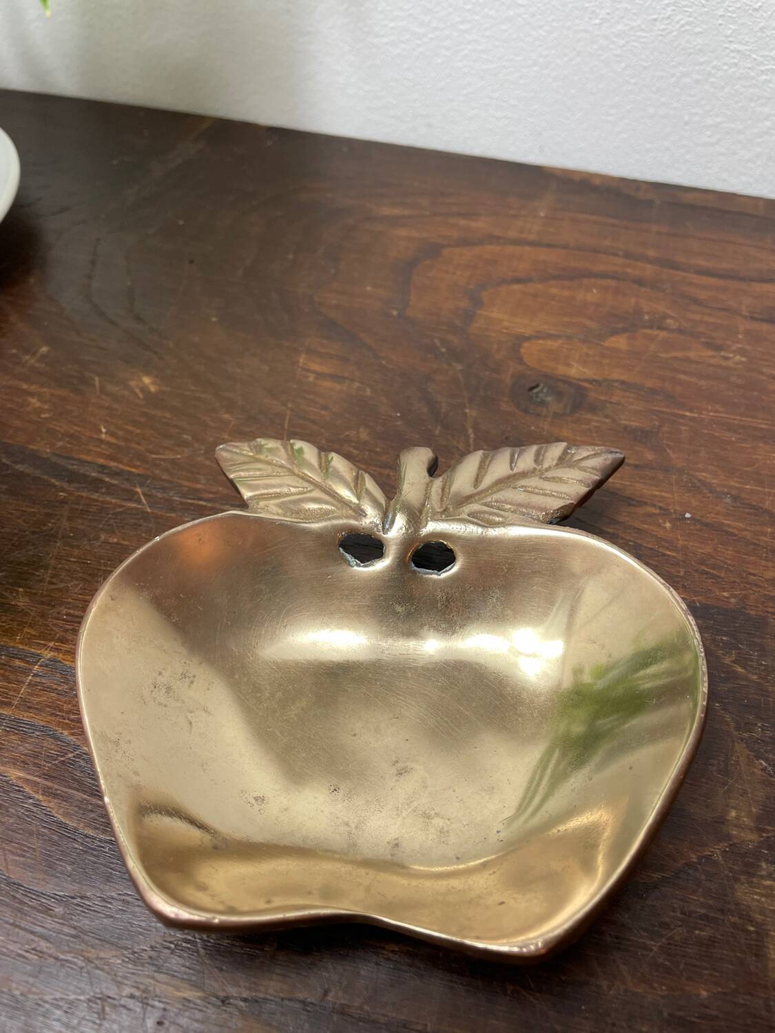 Cup, brass apple pocket