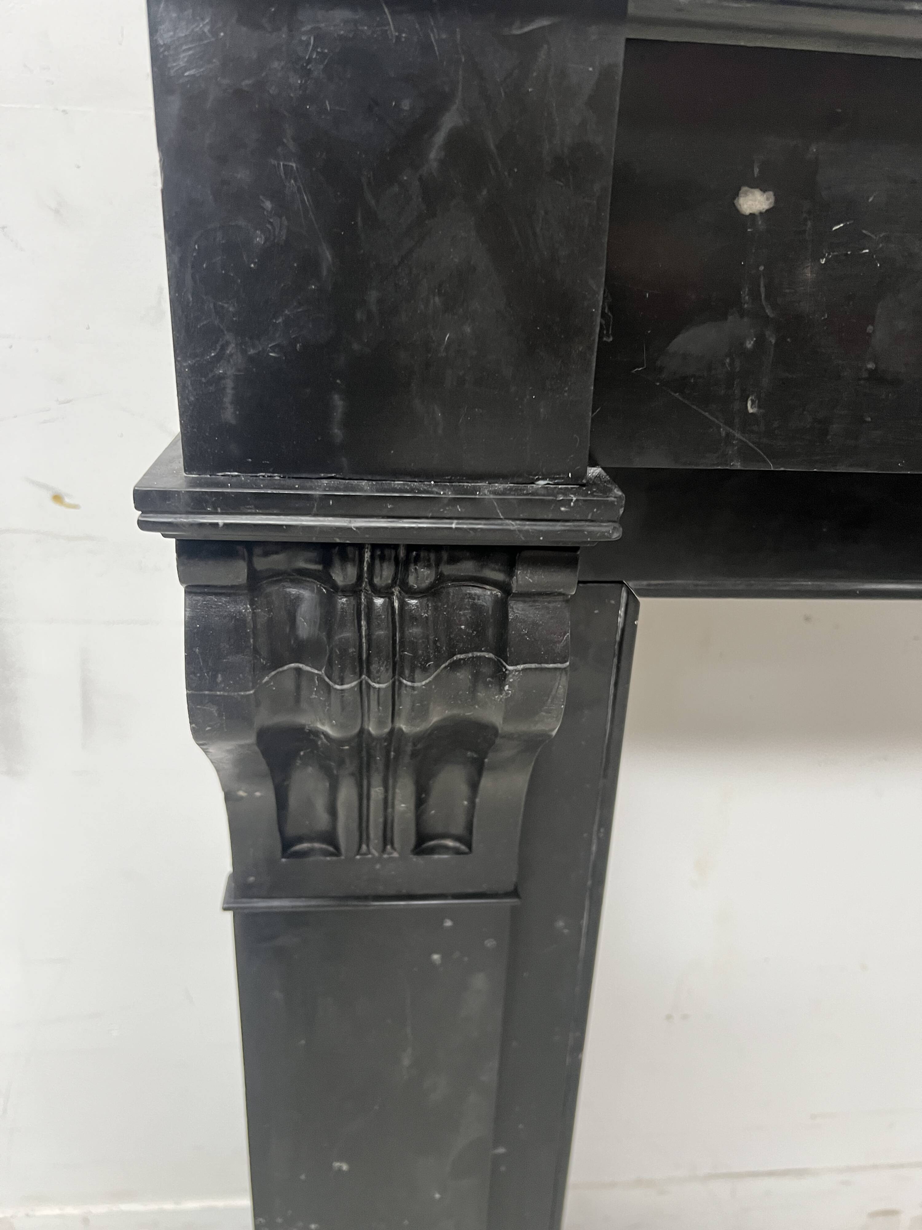 Napoleon III period fireplace with a black marble corbel. 19th century.