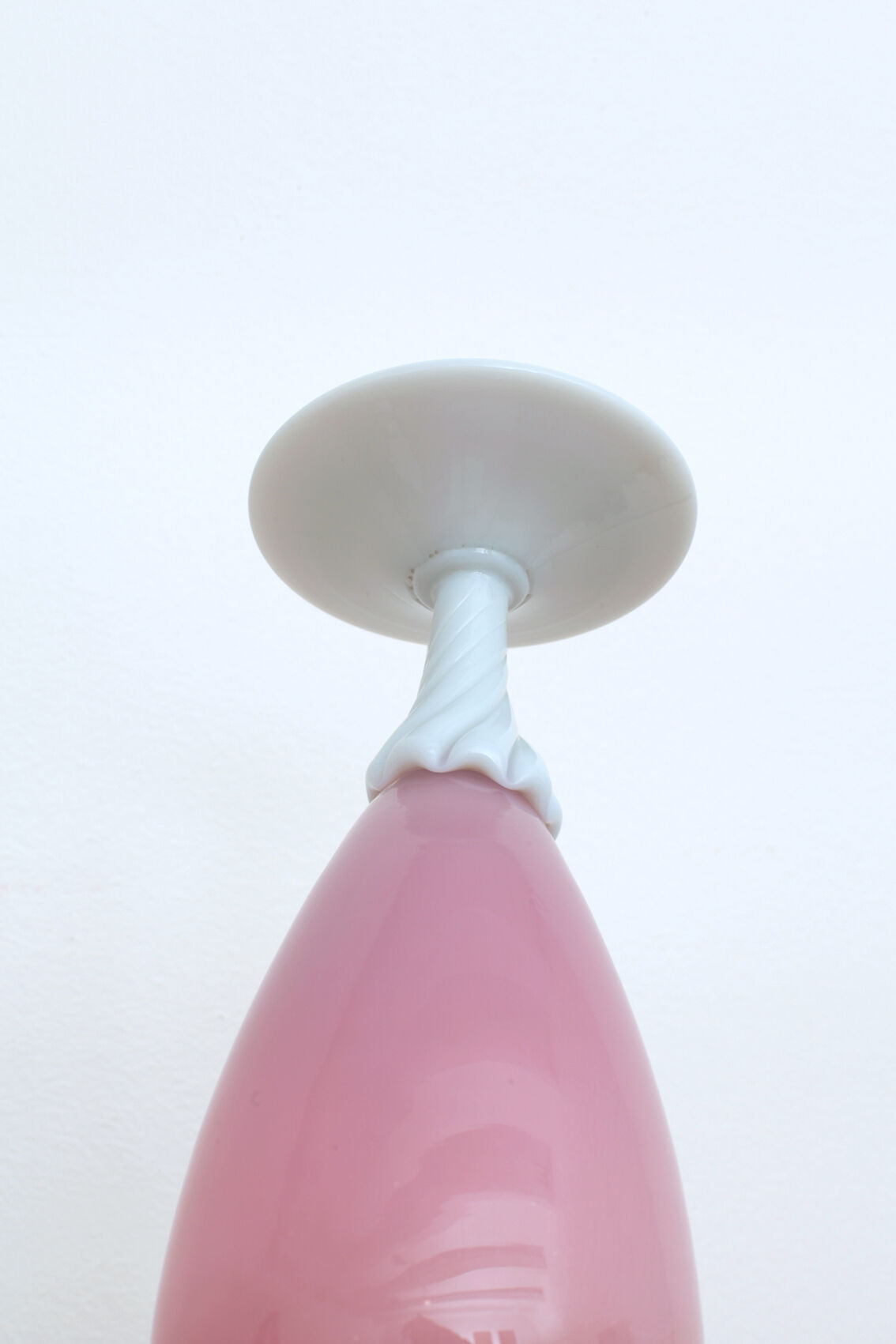 Pink vase foot twisted milk glass