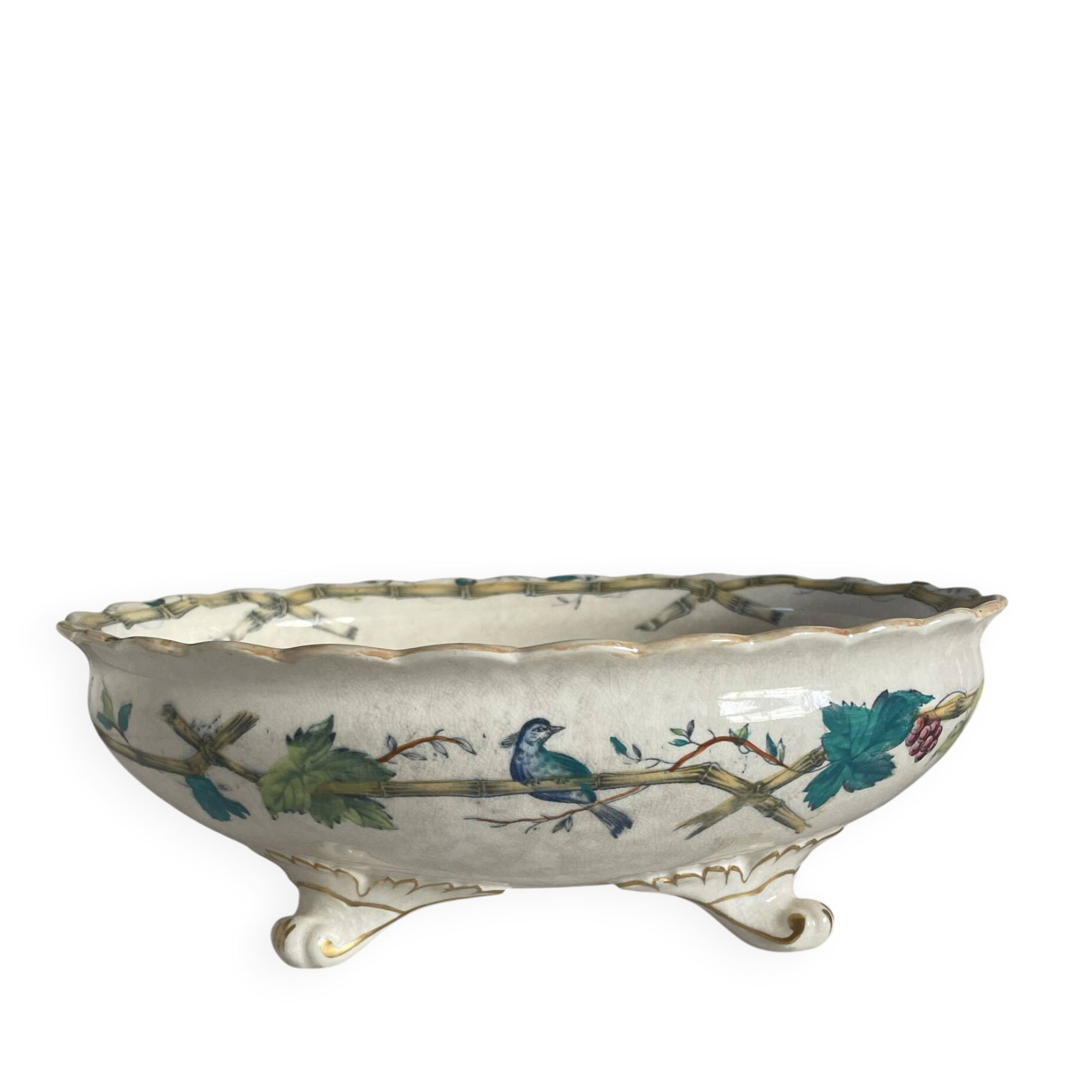 Oval jardinière in earthenware on legs with Japonese motif, birds, leaves.