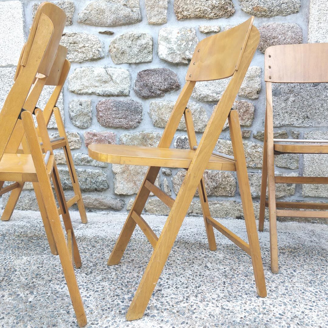 Four 60s wooden Stella chairs
