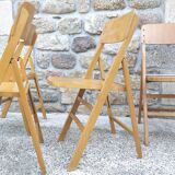 Four 60s wooden Stella chairs