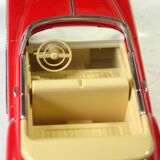 Red Cadillac 50s model car, made of metal, vintage from the 1970s