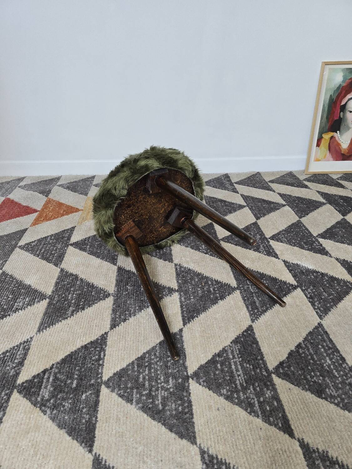 Green wooden tripod stool