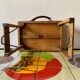 Old foldable fisherman's stool in wood and leather