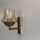 Yellow glass and brass wall light from the mid-century, 1960, Germany.