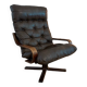 Vintage leather armchair with wooden armrests