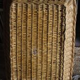 A large vintage rectangular wicker basket