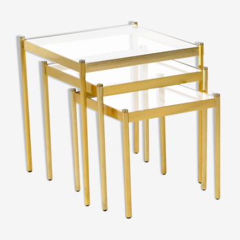 Midcentury nesting tables in bras and glass tops from italy, circa 1970