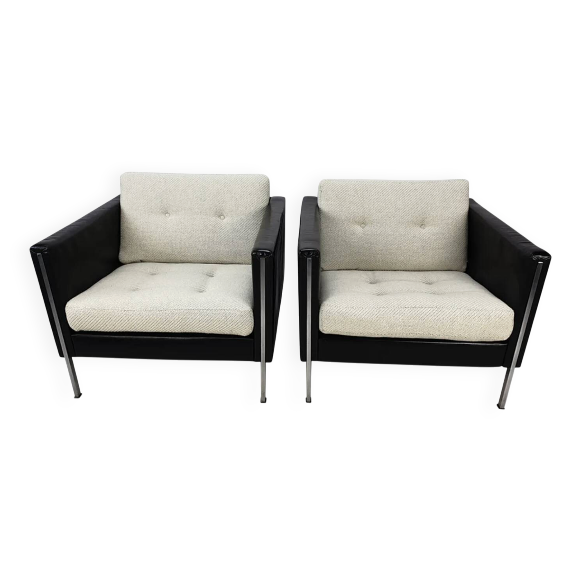 Pair of armchairs by Pierre Paulin for Artifort, black leather and cream fabric.